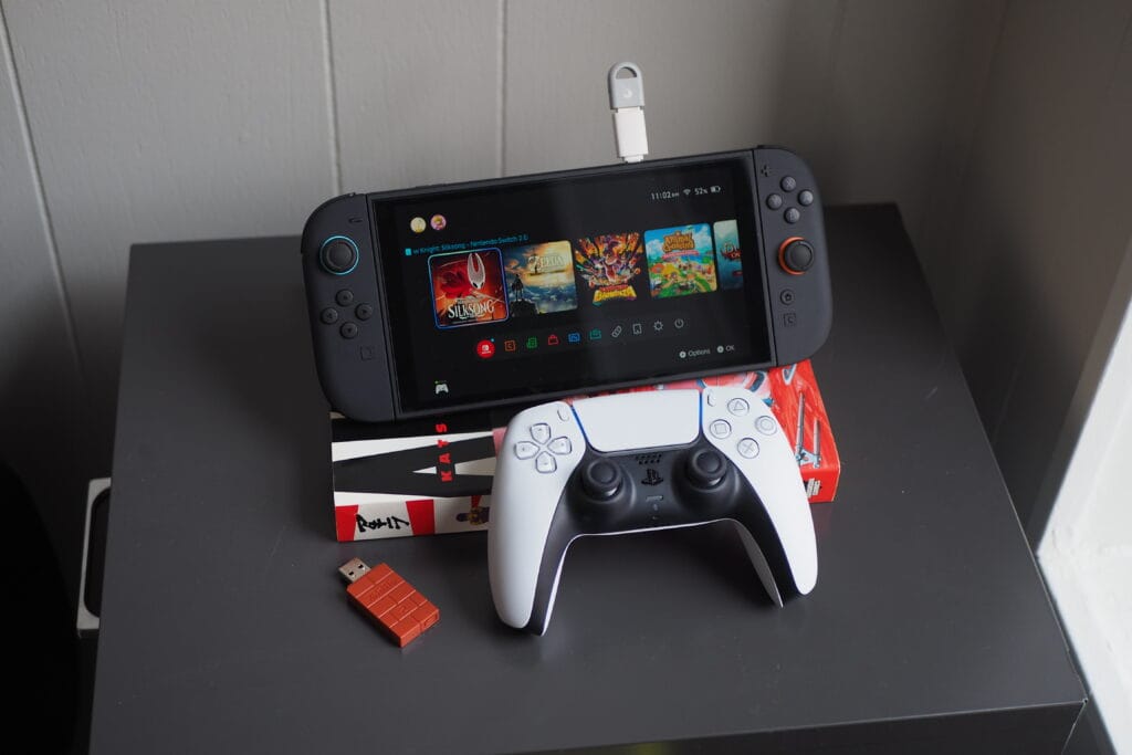 ​GuliKit’s tiny USB dongle lets you connect your PS5 controller to your Switch 2 